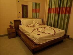 Blackout curtains, iron/ironing board, rollaway beds, free WiFi