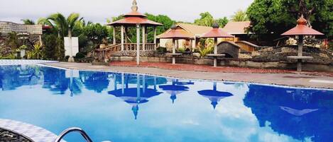 Outdoor pool, free pool cabanas