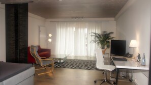 Caja fuerte, escritorio, cortinas opacas y sistema de insonorización