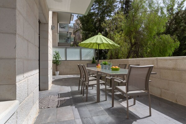 Deluxe Apartment, 3 Bedrooms, Garden View | Terrace/patio