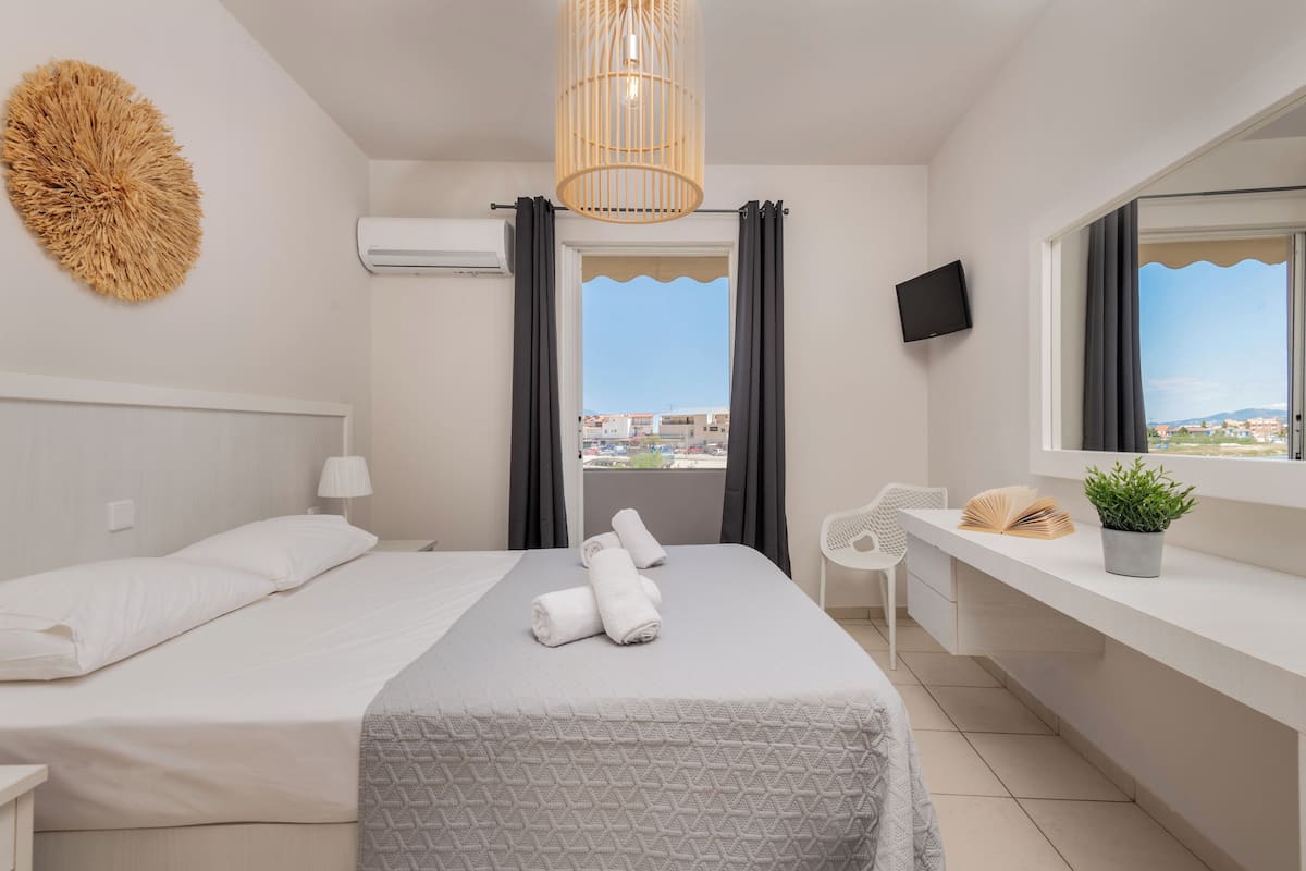 Departamento, balcón | 1 habitación, tabla de planchar con plancha, wifi gratis y ropa de cama