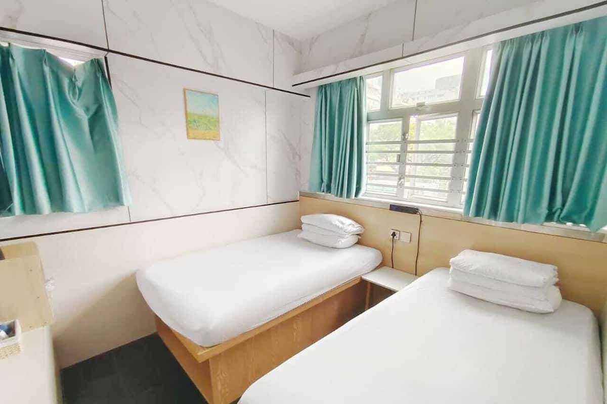 Family Triple Room | Iron/ironing board, free WiFi, bed sheets
