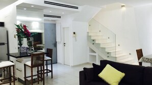 Royal Apartment, 2 Bedrooms, Garden View | Living area - Magical Duplex 100SM Garden Pool Parking (Herzliya)