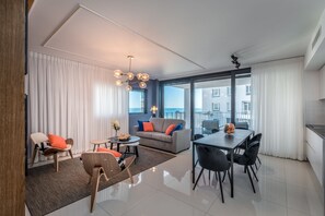 Deluxe Apartment, Multiple Beds, Non Smoking, Sea View | Living area | Plasma TV - Front of Beach - Trumpeldor Street (Tel Aviv)