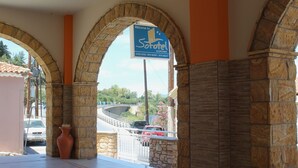 A stone archway leading to a sign for Sofotel Koper. - Sofotel (Pylos-Nestoras)