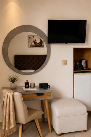 Double or Twin Room | Minibar, in-room safe, individually decorated, individually furnished