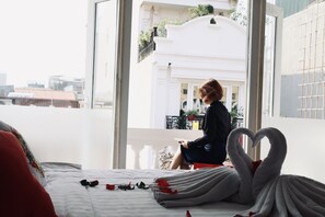 Deluxe Room, Balcony | Premium bedding, in-room safe, desk, blackout drapes - AncyrA TamTam Hotel by Continent - Near Hoan Kiem Lake (Hanoi)