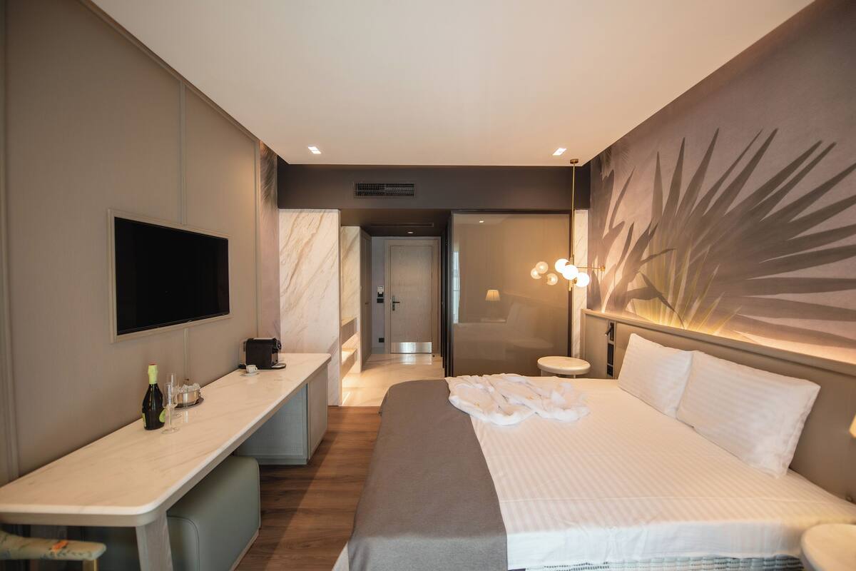 premium bedding, memory-foam beds, minibar, in-room safe