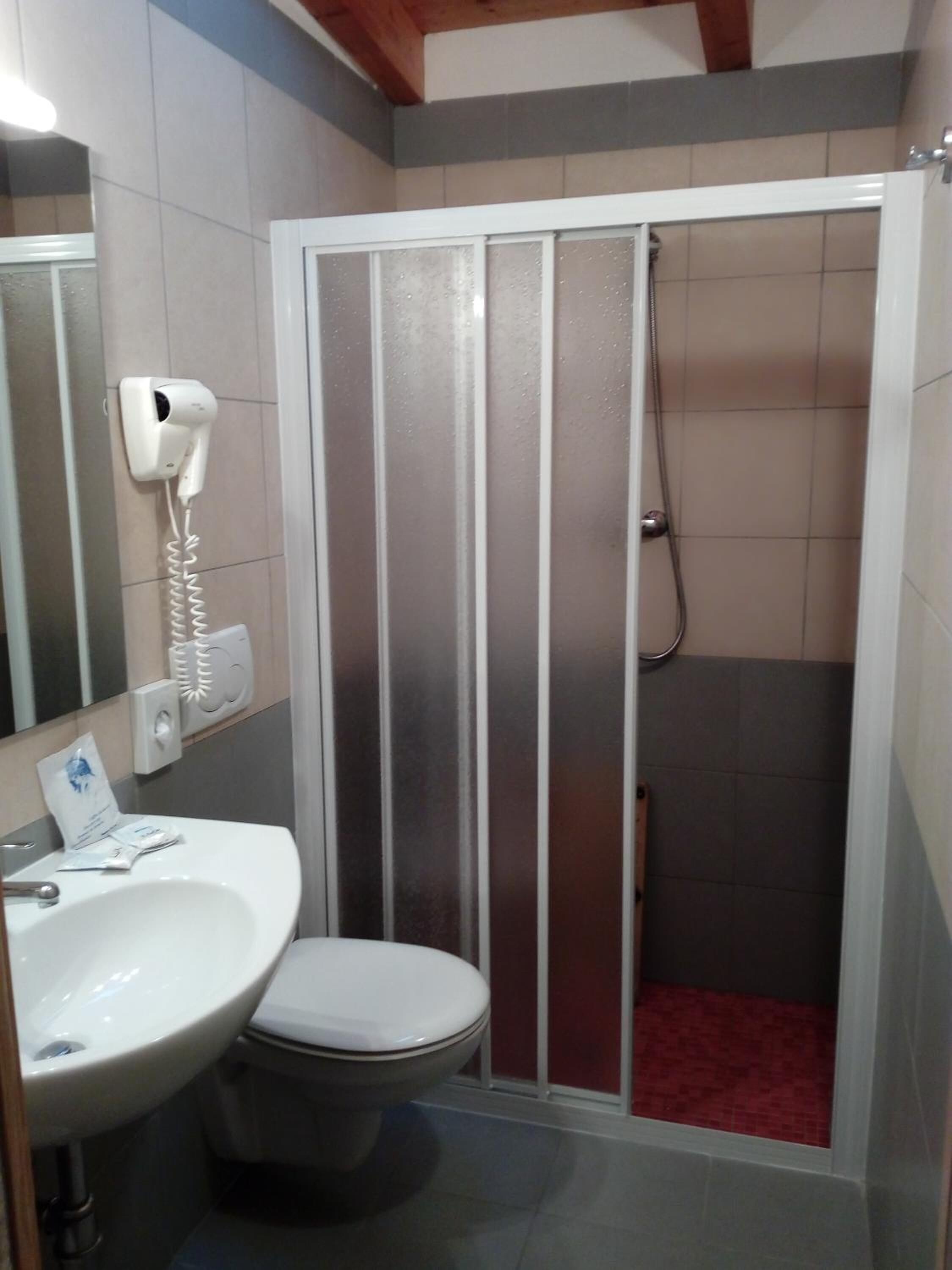 shower, rainfall showerhead, hair dryer, bidet