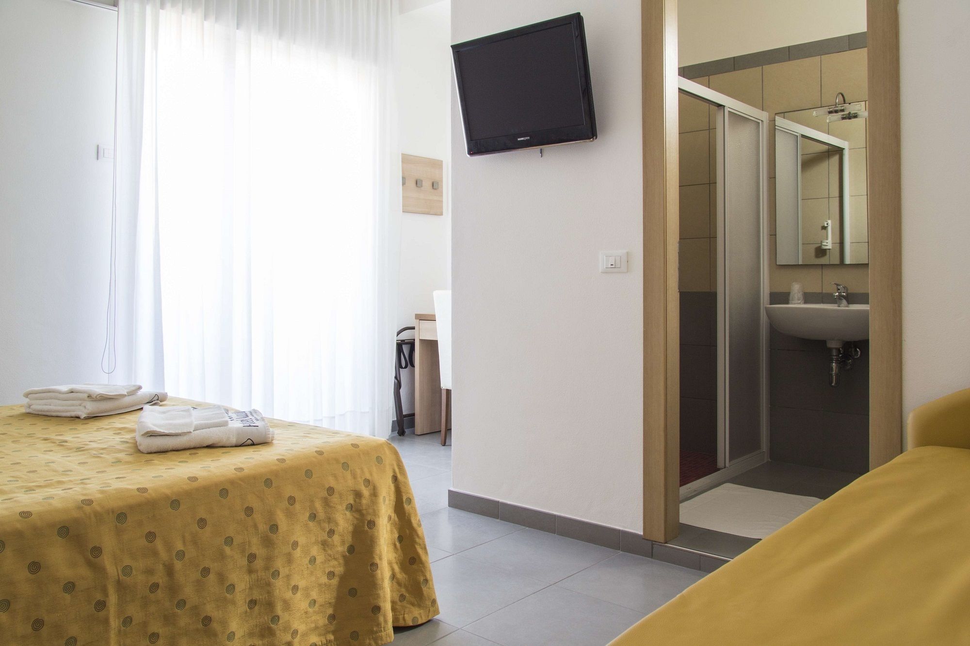 superior quadruple room | in-room safe, desk, free wifi, bed sheets