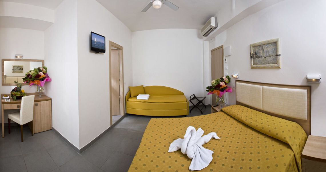 superior quadruple room | in-room safe, desk, free wifi, bed sheets