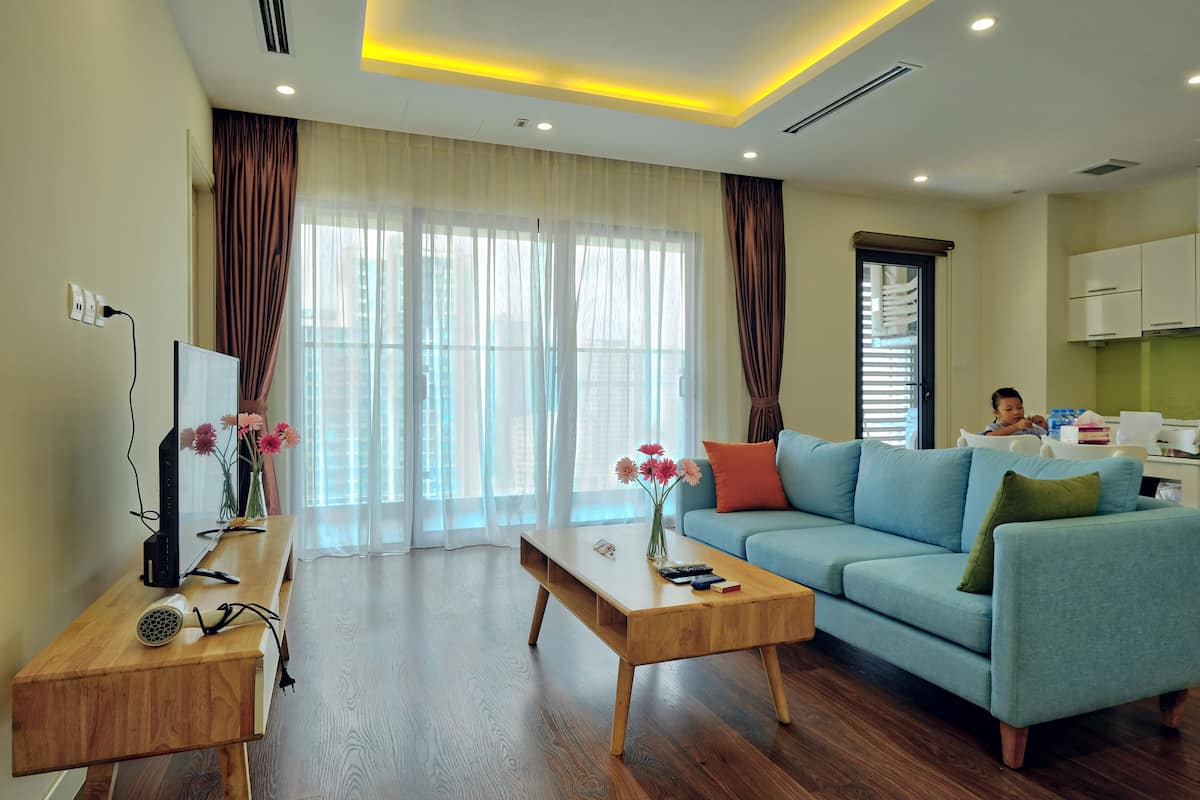 Apartment, 3 Bedrooms | Living area | Flat-screen TV