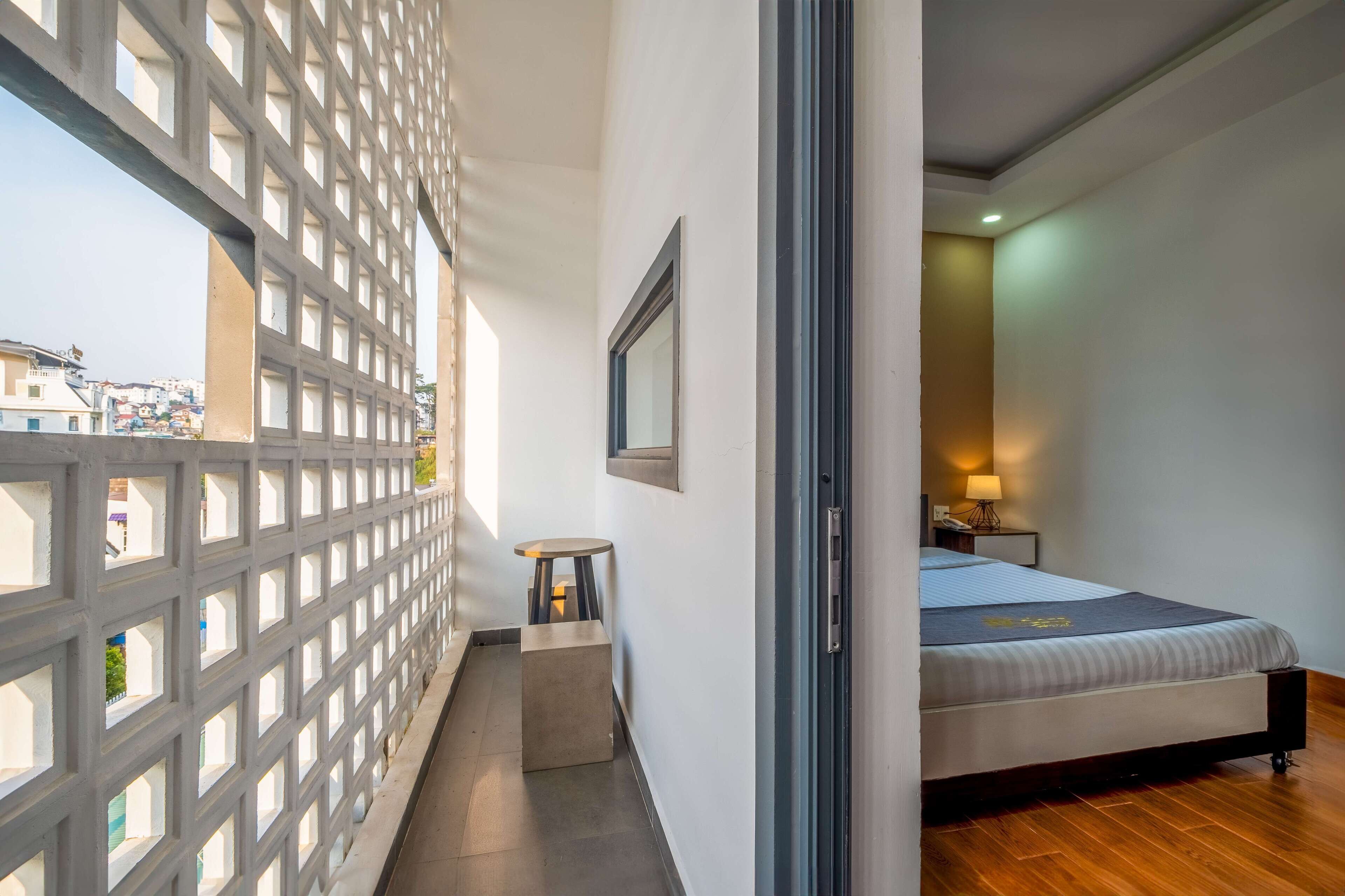 Deluxe Room, Balcony | Minibar, desk, blackout drapes, free WiFi