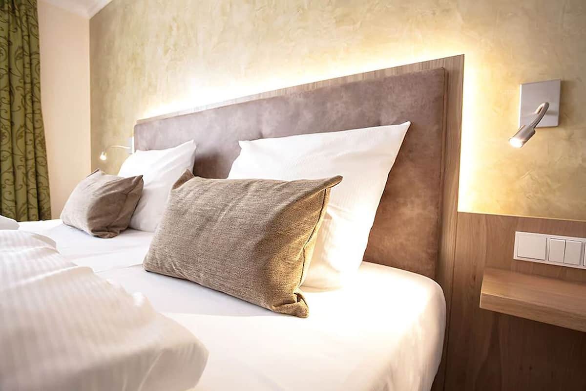 hypo-allergenic bedding, in-room safe, desk, blackout curtains