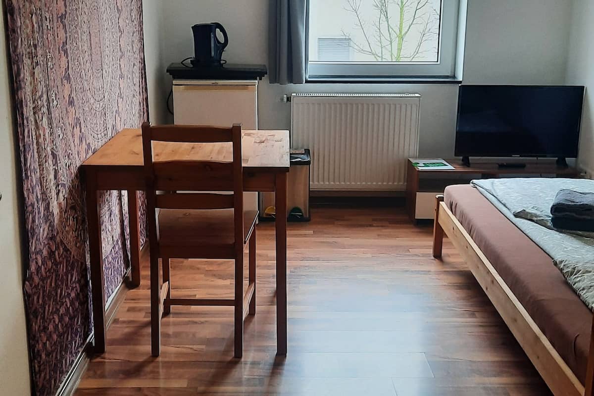 Blackout drapes, soundproofing, WiFi (free), bed sheets