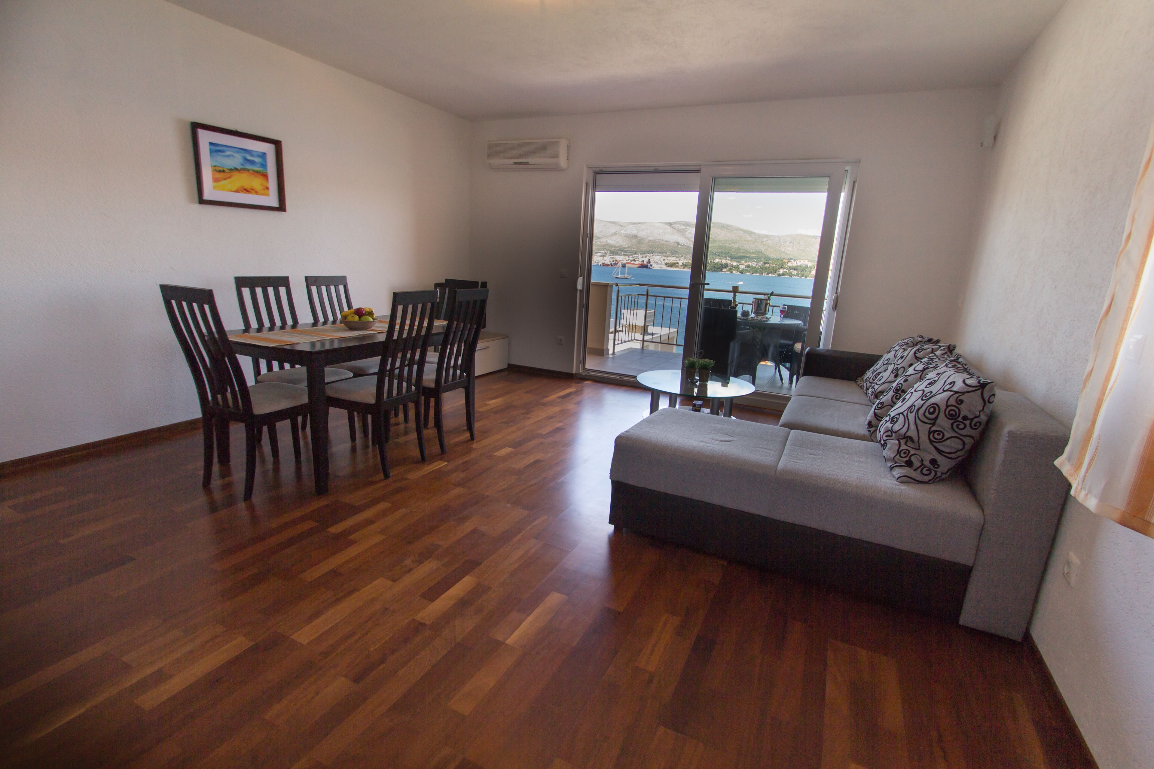 Family Apartment, Sea View | Living room | Flat-screen TV