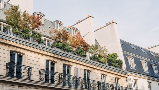 A multi-story building with balconies, large windows, and a classic architectural style. - HIGHSTAY - Luxury Serviced Apartments - Place Vendôme (Paris)