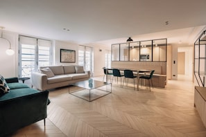 Saint Honoré IV | Living area | 55-inch flat-screen TV with cable channels, TV, Netflix