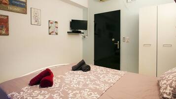 Apartament | Planxa i posts de planxar, wifi gratuïta i roba de llit