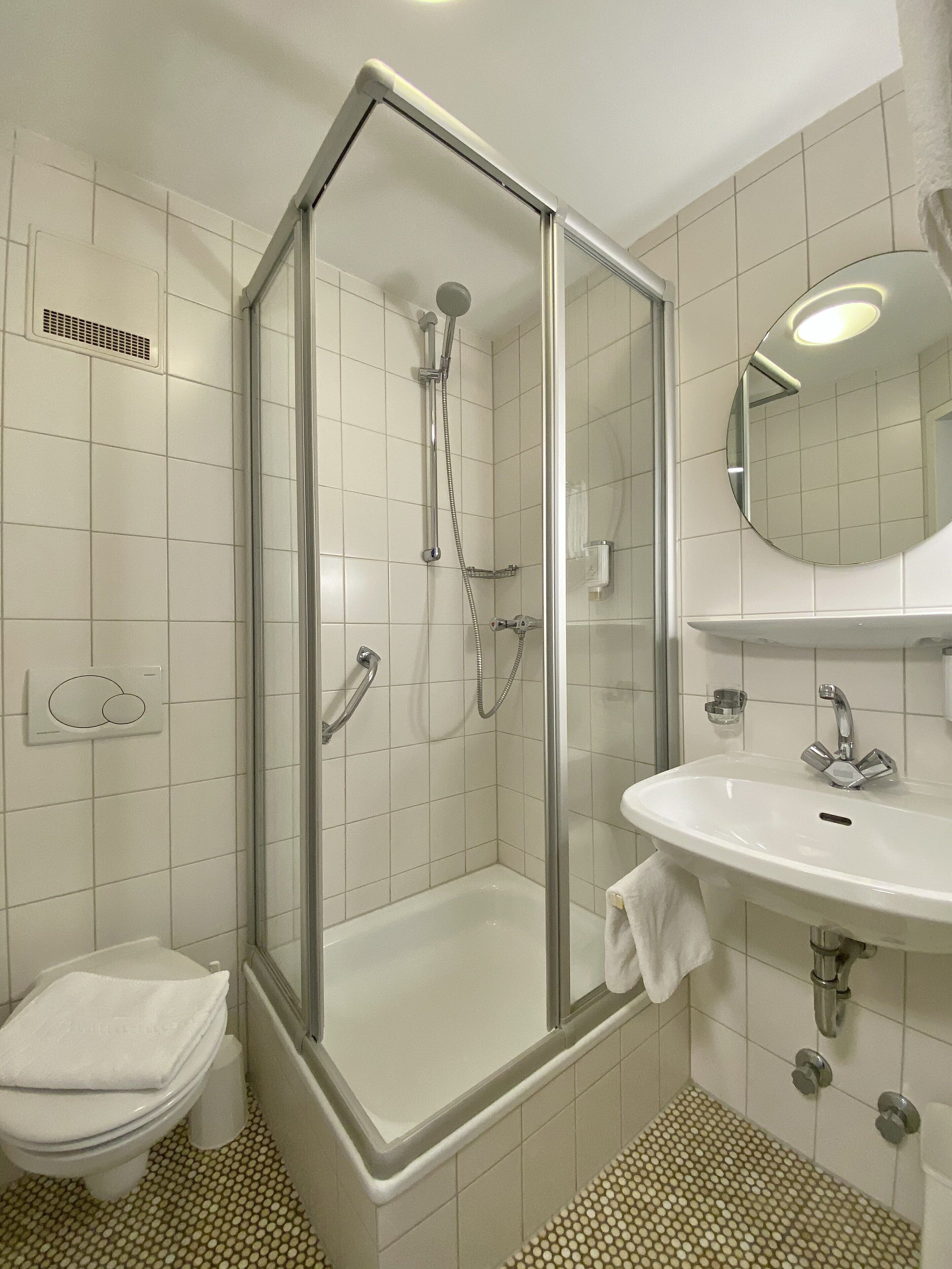 single room | bathroom | shower, rainfall showerhead, free toiletries, hair dryer