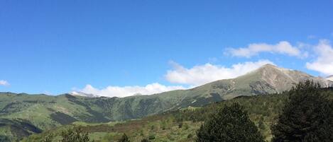 A mountainous landscape with a clear sky.