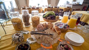 A breakfast buffet with various food items and beverages. - The Ritz House (Lisdoonvarna)
