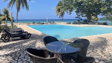 Outdoor pool, pool umbrellas, pool loungers