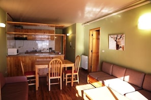 Apartment, 1 Bedroom, Mountain View | Living area | 32-inch LCD TV with satellite channels, TV, fireplace - MzaarViews Chalets (Mzaar Kfardebian)