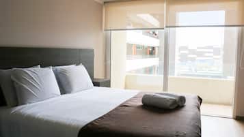 Premium bedding, memory-foam beds, in-room safe, blackout curtains