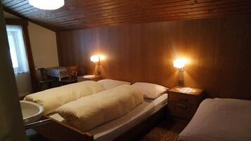 Desk, blackout curtains, bed sheets