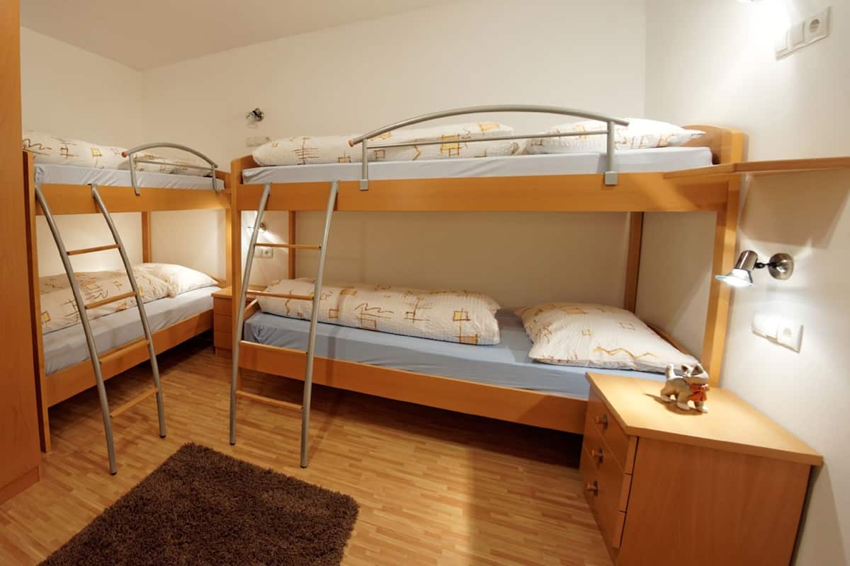 Apartment, 2 Bedrooms (Margerite) | Desk, blackout drapes, bed sheets
