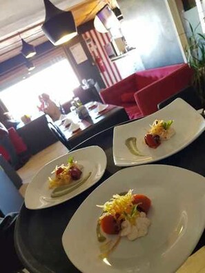 Breakfast, lunch, dinner served; beach views