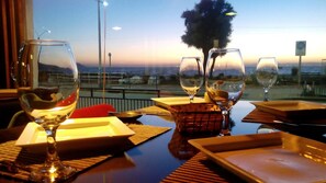 Breakfast, lunch, dinner served; beach views