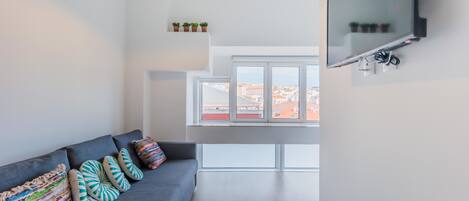 พาโนรามิกอพาร์ทเมนท์, วิวเมือง | บริเวณนั่งเล่น | ทีวีจอแบน