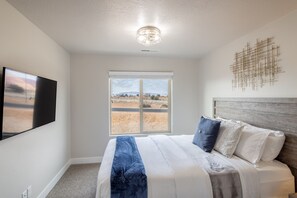 4 bedrooms, desk, iron/ironing board, travel cot