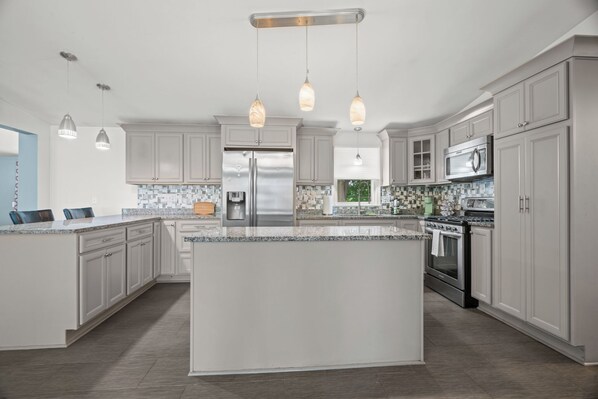 Fridge, microwave, oven, stovetop - Modern and charming home minutes to downtown! (Johnston)