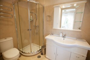 Bathtub, hair dryer, towels