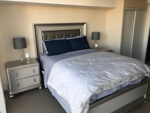 Suíte, 2 quartos | Ferros/tábuas de passar roupa, Wi-Fi de cortesia, roupa de cama
