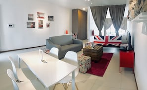 Studio | Living area | Flat-screen TV - Romantic Mansion at The Landmark (George Town)