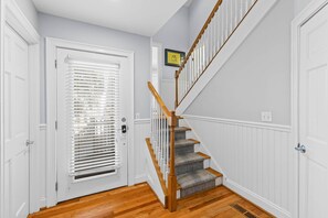 A staircase with wooden balusters and carpeted steps leading to an upper floor. - Fairway Dunes 27 - Screen Porch Golf Course View! (Isle of Palms)