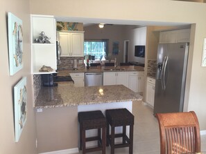 Fridge, microwave, oven, stovetop - 5⭐️ LUXURY BEACH VILLA with SECLUDED HEATED POOL+HOT TUB SURROUNDED by PALM TREES (Naples)