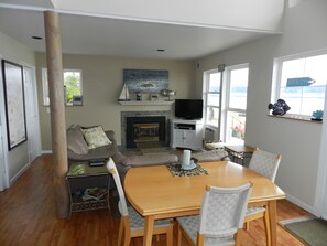 Smart TV, fireplace, DVD player, books