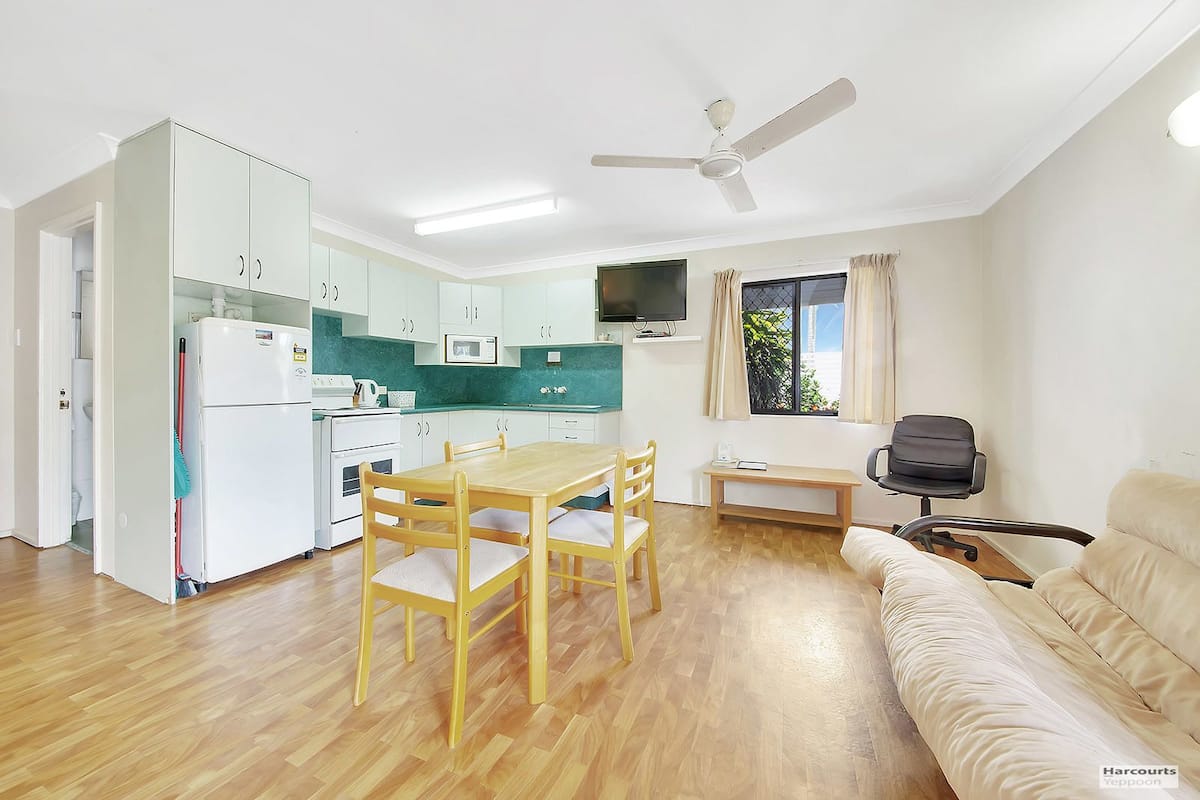 Apartment, 1 Bedroom | Living area | Flat-screen TV, DVD player