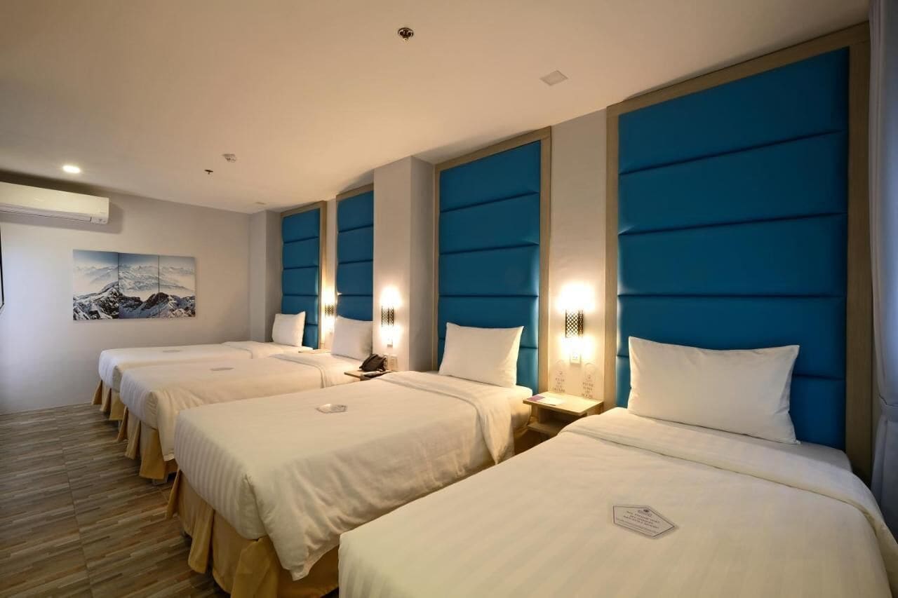 quadruple room | 1 bedroom, down duvets, in-room safe, desk