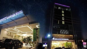 A hotel with a modern facade and a sign that reads "AMETHYST BOUTIQUE HOTEL". - Amethyst Boutique Hotel Cebu powered by Cocotel (Cebu City)