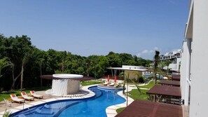 3 outdoor pools, pool umbrellas, sun loungers