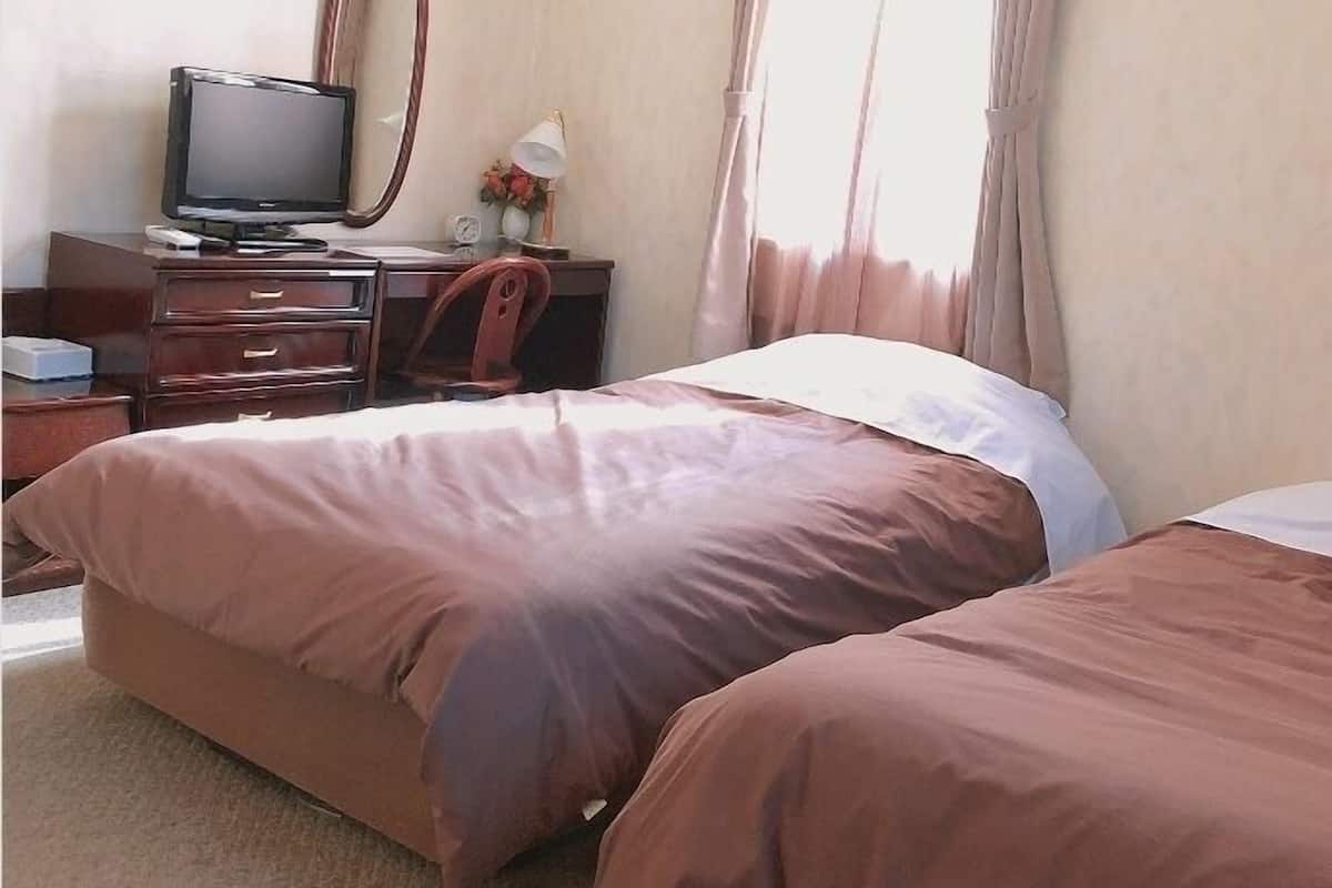 Down duvets, individually furnished, desk, blackout curtains