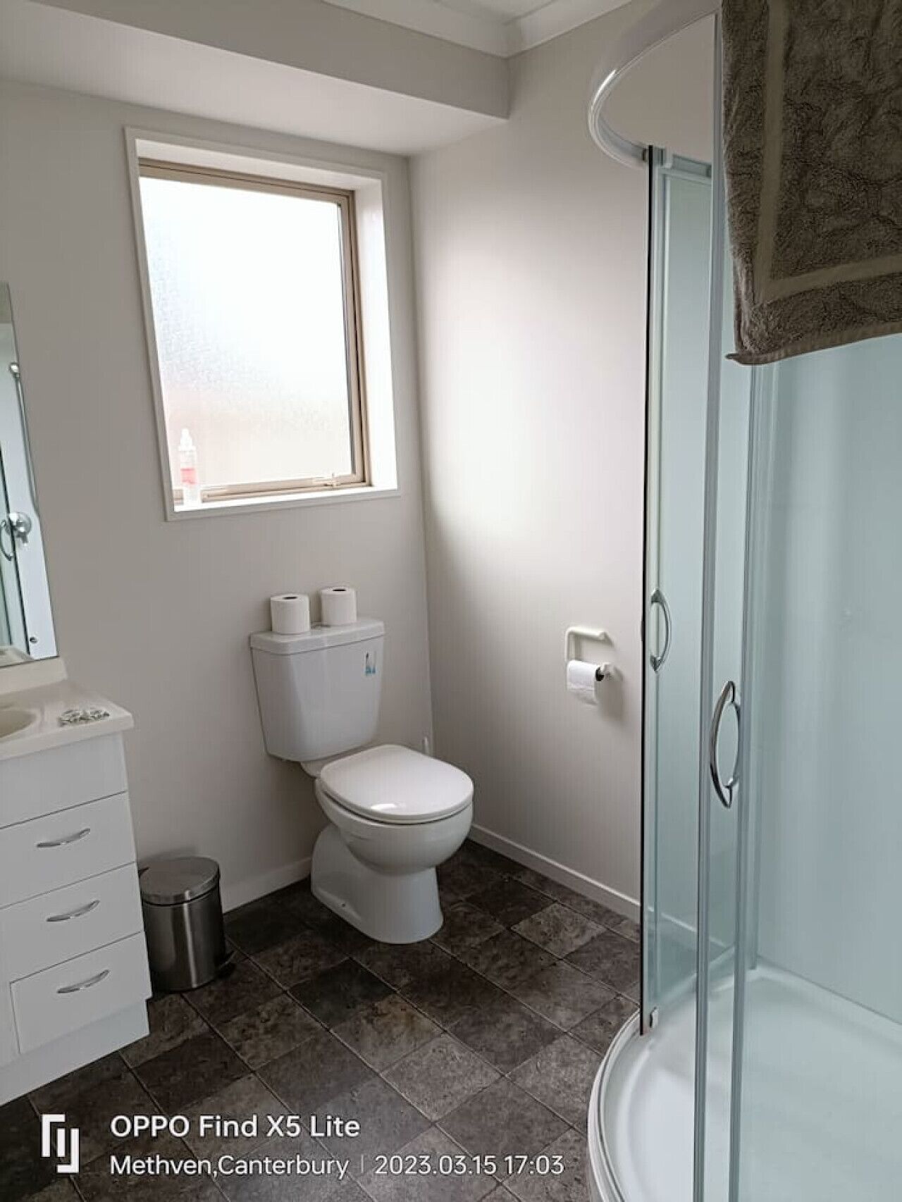 Bathtub, hair dryer, towels, soap