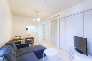 Apartment with Loft I | Living area | 32-inch flat-screen TV with digital channels, TV - Soshigaya Apartment (Tokyo)