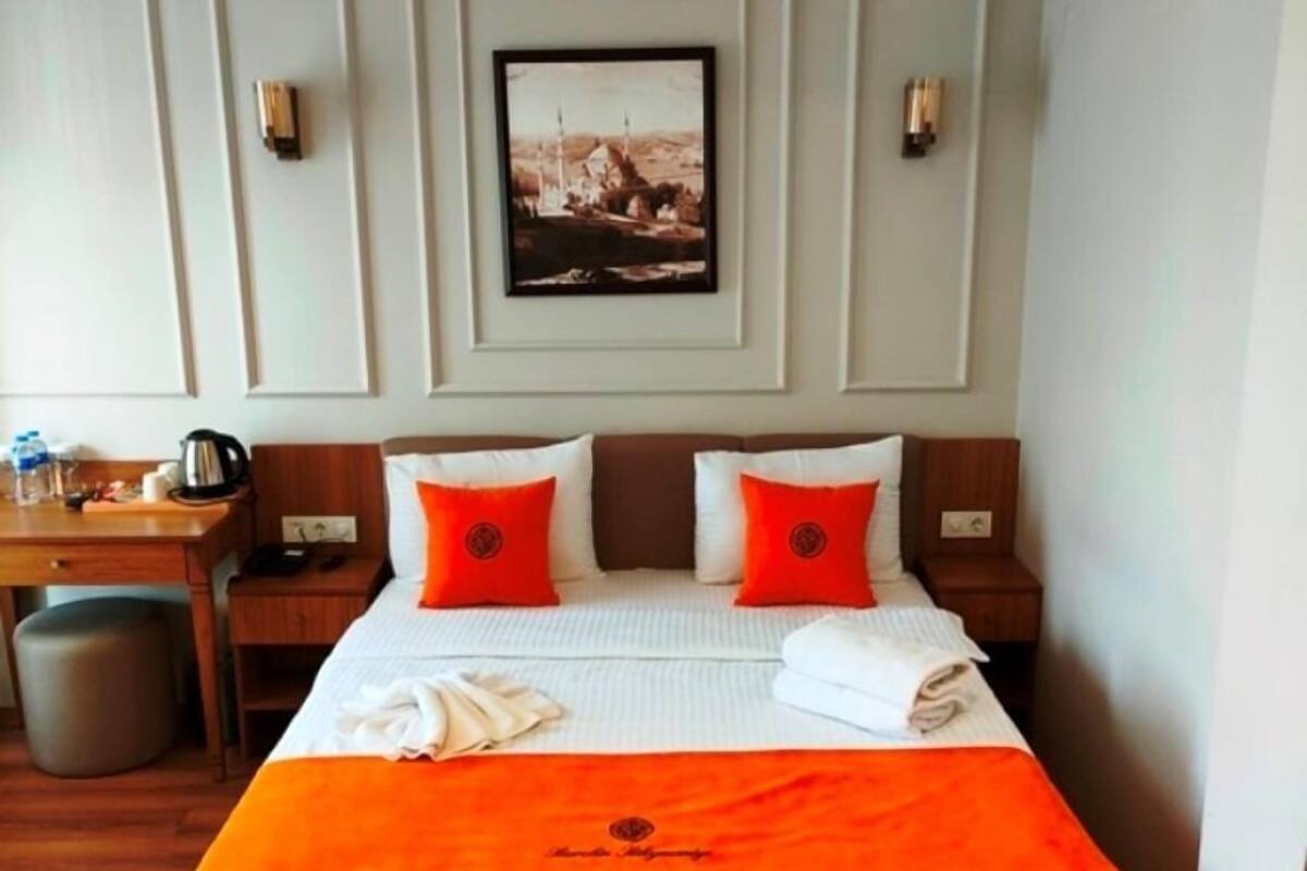 Habitación económica | Ropa de cama de alta calidad y camas con efecto memoria